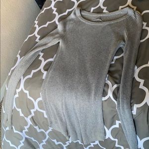 Lululemon sweater. Maybe worn 3x